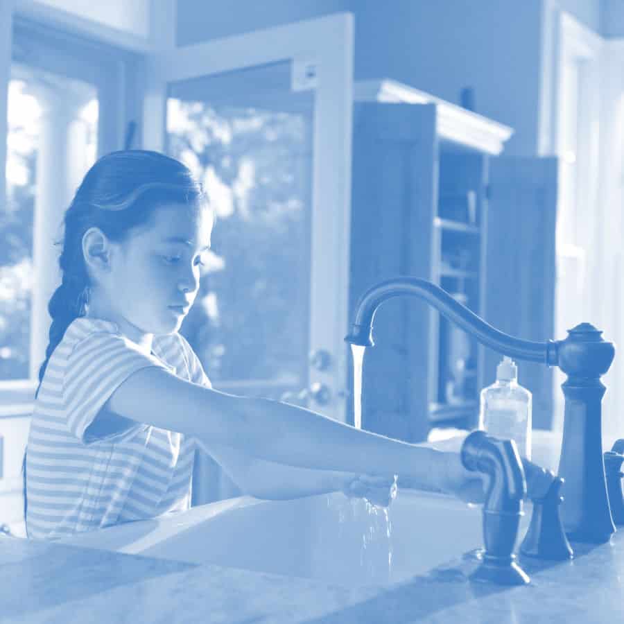 A Girl washing her hands